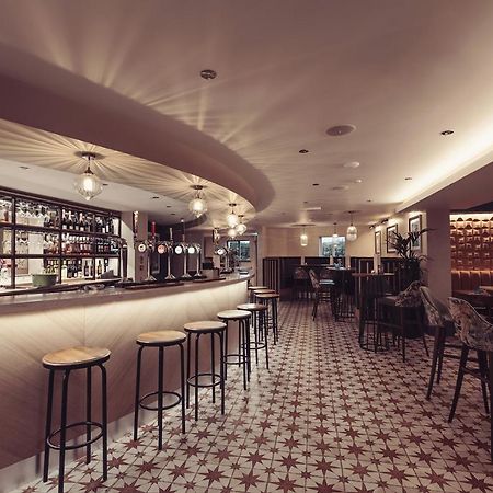 Longlands Inn & Cottages Carnforth Extérieur photo The bar at the 2018 edition of the London Design Festival