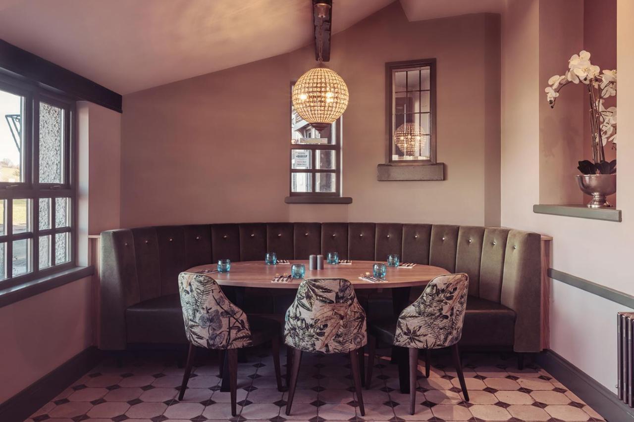 Longlands Inn & Cottages Carnforth Extérieur photo The restaurant's interior